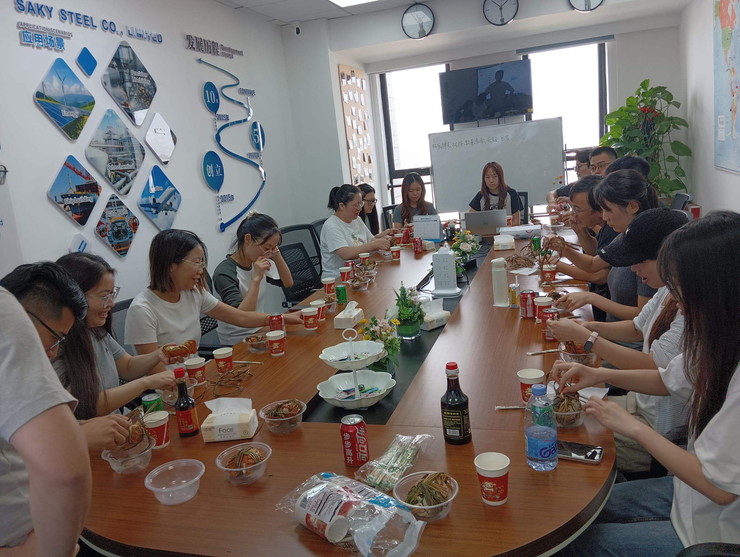 SAKY STEEL team sharing a company lunch during an autumn hairy crab gathering