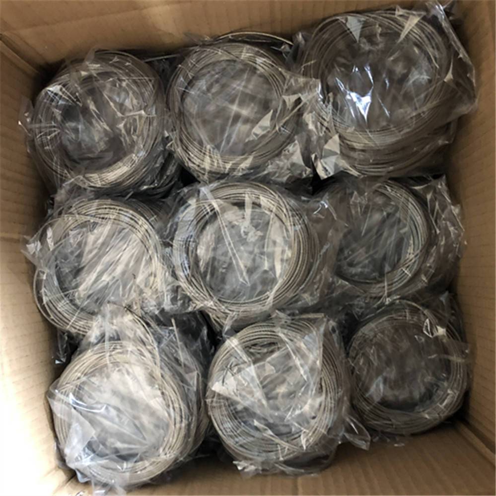 Coiled stainless steel cable packed in cartons